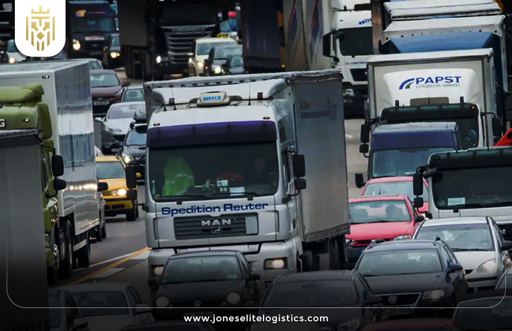 image of delivery trucks stuck in heavy traffic | JEL