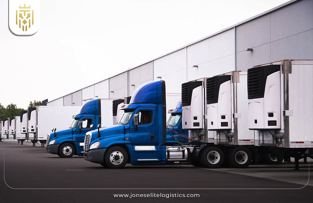 image of a refrigerated warehouse with trucks | JEL
